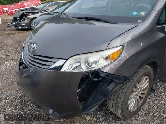 2012 Toyota Sienna XLE AAS with VIN 5TDYK3DC5CS224787, listed as a IAAI auction lot 42519653 with 139,062 mi miles and . Bid and sale history available at DreamBid. Image 6.