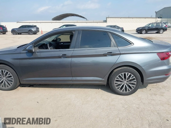2021 Volkswagen Jetta S z VIN 3VWC57BU0MM093075, wystawiony jako IAAI lot #42067395 z przebiegiem 24 930 mil mil oraz . Historia ofert i sprzedaży dostępna na DreamBid. Obrazek 14.