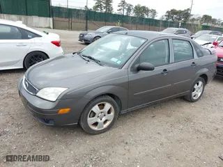 2007 Ford Focus S with VIN 1FAHP34N27W241819, listed as a IAAI auction lot 42040284 with 90,220 mi miles. Bid and sale history available at carsss.com. Image 2.