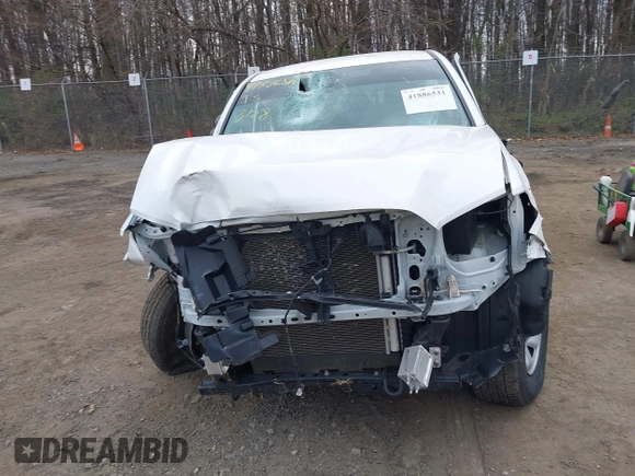 2022 Toyota Tacoma SR with VIN 3TYAX5GN3NT062077, listed as a IAAI auction lot 41886531 with 58,687 mi miles and . Bid and sale history available at DreamBid. Image 12.