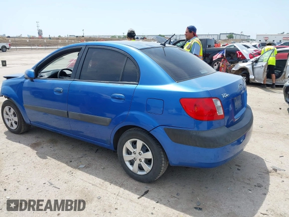 2008 Kia Rio LX with VIN KNADE123886374992, listed as a IAAI auction lot 42027536 with 129,916 mi miles and . Bid and sale history available at DreamBid. Image 3.