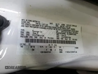 2012 Ford Focus SE with VIN 1FAHP3F20CL451852, listed as a Copart auction lot 60310765 with 150,305 mi miles and Salvage title. Bid and sale history available at DreamBid. Image 12.