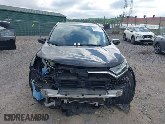 2021 Honda CR-V Touring with VIN 5J6RW2H92ML003064, listed as a IAAI auction lot 42298361 with 70,988 mi miles and . Bid and sale history available at DreamBid. Image 13.