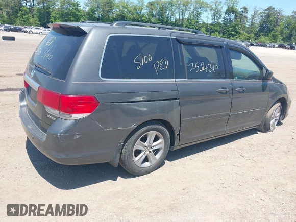 2010 Honda Odyssey Touring z VIN 5FNRL3H90AB085105, wystawiony jako IAAI lot #42142123 z przebiegiem Nie podano mil oraz . Historia ofert i sprzedaży dostępna na DreamBid. Obrazek 4.