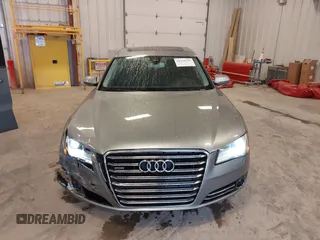 2012 Audi A8 with VIN WAURVAFD7CN021716, listed as a IAAI auction lot 42330229 with 97,359 mi miles and . Bid and sale history available at DreamBid. Image 12.