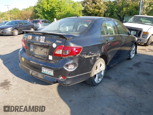 2009 Toyota Corolla XRS with VIN 1NXBE40E59Z003796, listed as a IAAI auction lot 42077772 with 215,159 mi miles. Bid and sale history available at carsss.com. Image 4.