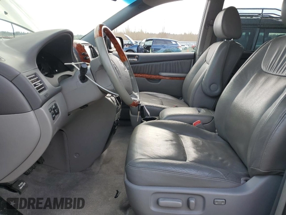 2010 Toyota Sienna XLE with VIN 5TDDK4CC0AS032292, listed as a Copart auction lot 48085825 with 127,599 mi miles and Clean title. Bid and sale history available at DreamBid. Image 7.