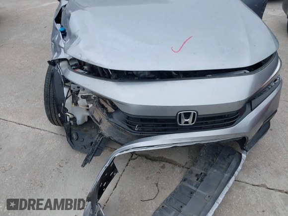 2023 Honda Civic EX with VIN 2HGFE1F77PH321210, listed as a IAAI auction lot 42379950 with Not provided miles and . Bid and sale history available at DreamBid. Image 6.