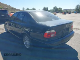 2001 BMW 5 Series 530iA with VIN WBADT63421CF01580, listed as a IAAI auction lot 41626798 with 146,647 mi miles. Bid and sale history available at carsss.com. Image 3.