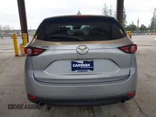 2020 Mazda CX-5 Grand Touring with VIN JM3KFADM0L0738693, listed as a IAAI auction lot 41725906 with 63,629 mi miles. Bid and sale history available at carsss.com. Image 17.