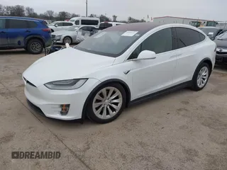 2020 Tesla Model X Long Range with VIN 5YJXCDE2XLF284847, listed as a IAAI auction lot 41595151 with 29,466 mi miles. Bid and sale history available at carsss.com. Image 2.