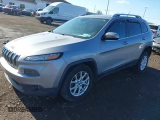 2014 Jeep Cherokee Latitude with VIN 1C4PJMCBXEW107559, listed as a IAAI auction lot 41859246 with 94,812 mi miles and . Bid and sale history available at DreamBid. Image 2.