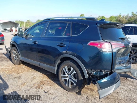 2018 Toyota RAV4 LE with VIN JTMZFREV1JJ203943, listed as a IAAI auction lot 41921863 with 104,691 mi miles. Bid and sale history available at carsss.com. Image 3.