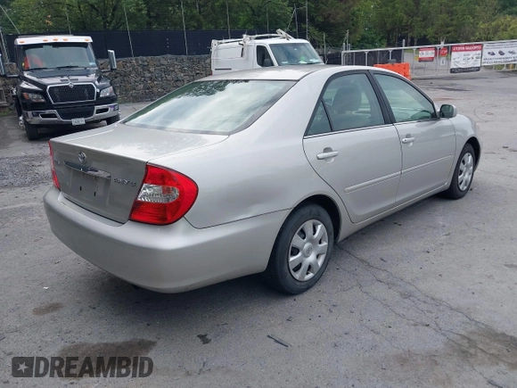 2004 Toyota Camry LE with VIN 4T1BE32K14U857478, listed as a IAAI auction lot 42654878 with 210,542 mi miles and . Bid and sale history available at DreamBid. Image 4.