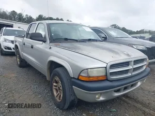 2003 Dodge Dakota z VIN 1D7HL38Z83S184469, wystawiony jako IAAI lot #41714931 z przebiegiem 194 373 mil mil oraz . Historia ofert i sprzedaży dostępna na DreamBid. Obrazek 1.