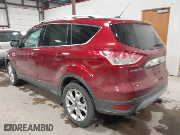 2014 Ford Escape Titanium with VIN 1FMCU9J9XEUA51732, listed as a IAAI auction lot 41542867 with 44,141 mi miles. Bid and sale history available at carsss.com. Image 3.