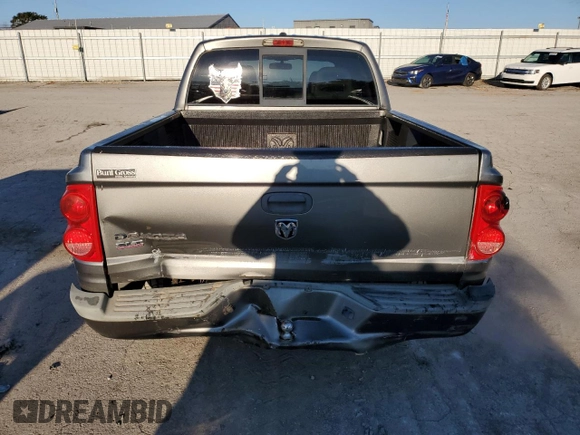 2006 Dodge Dakota SLT with VIN 1D7HW48K46S624630, listed as a Copart auction lot 76592394 with 135,679 mi miles and Salvage Title. Bid and sale history available at carsss.com. Image 6.