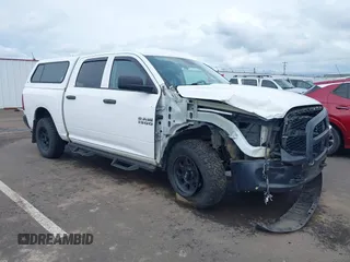 2014 Ram 1500 Tradesman with VIN 1C6RR7KG4ES323888, listed as a IAAI auction lot 41975474 with 93,779 mi miles and . Bid and sale history available at DreamBid. Image 1.