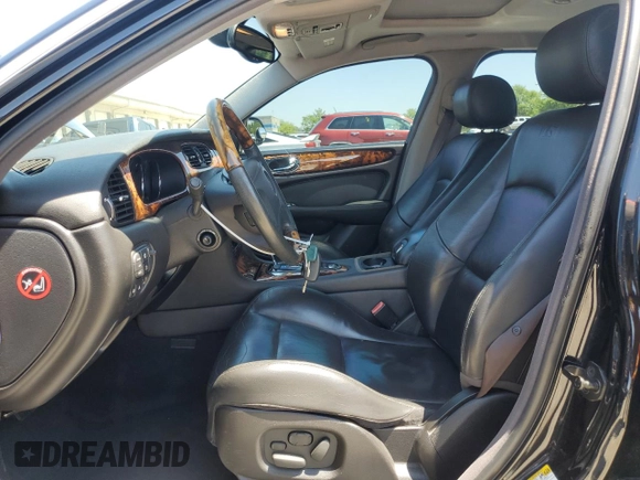 2004 Jaguar XJ с VIN SAJEA73B34TG10749, выставлен на аукционе Copart как лот 56574025 с пробегом 72 240 миль миль и Списание • Salvage title. История ставок и продаж доступна на DreamBid. Изображение 7.
