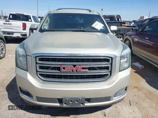 2015 GMC Yukon SLT with VIN 1GKS1BKC1FR145694, listed as a IAAI auction lot 41851644 with 162,592 mi miles. Bid and sale history available at carsss.com. Image 12.