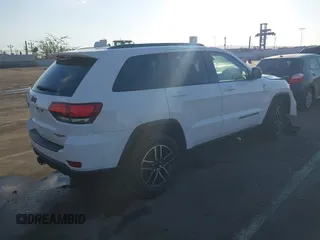 2021 Jeep Grand Cherokee Trailhawk with VIN 1C4RJFLG5MC565316, listed as a IAAI auction lot 41402435 with 69,261 mi miles. Bid and sale history available at carsss.com. Image 4.