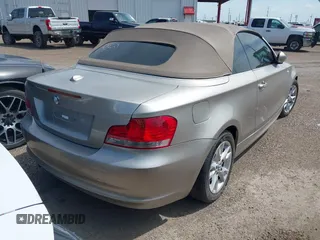 2009 BMW 1 Series 128i with VIN WBAUL73529VJ74898, listed as a IAAI auction lot 42690194 with 134,407 mi miles and . Bid and sale history available at DreamBid. Image 4.