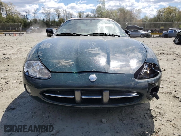 2002 Jaguar XK with VIN SAJDA42C22NA23724, listed as a Copart auction lot 53521005 with 61,468 mi miles and Salvage Title. Bid and sale history available at DreamBid. Image 5.