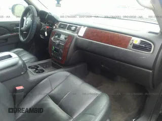 2012 Chevrolet Suburban LT z VIN 1GNSCJE02CR318840, wystawiony jako IAAI lot #27643083 z przebiegiem 122 013 mil mil oraz . Historia ofert i sprzedaży dostępna na DreamBid. Obrazek 5.