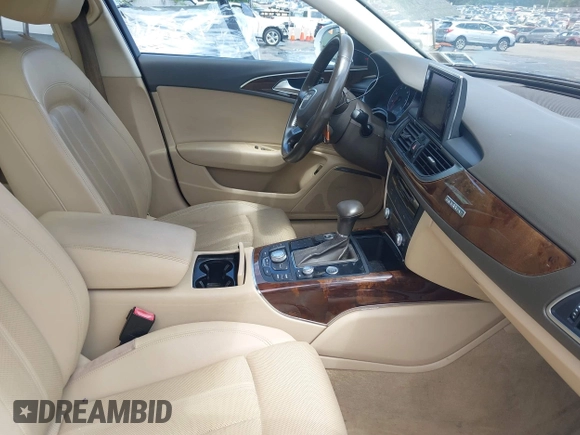 2014 Audi A6 Prestige with VIN WAUHGAFCXEN091050, listed as a IAAI auction lot 42524560 with 169,575 mi miles and . Bid and sale history available at DreamBid. Image 5.