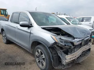 2019 Honda Ridgeline RTL-E z VIN 5FPYK3F73KB006244, wystawiony jako IAAI lot #42167460 z przebiegiem 53 498 mil mil oraz . Historia ofert i sprzedaży dostępna na DreamBid. Obrazek 1.