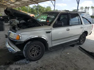 1999 Ford Expedition XLT with VIN 1FMRU1764XLB74671, listed as a Copart auction lot 70695974 with Not provided miles and Salvage title. Bid and sale history available at DreamBid. Image 1.