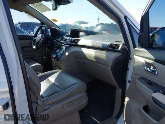 2014 Honda Odyssey Touring with VIN 5FNRL5H97EB037361, listed as a IAAI auction lot 42106742 with 198,279 mi miles and . Bid and sale history available at DreamBid. Image 5.