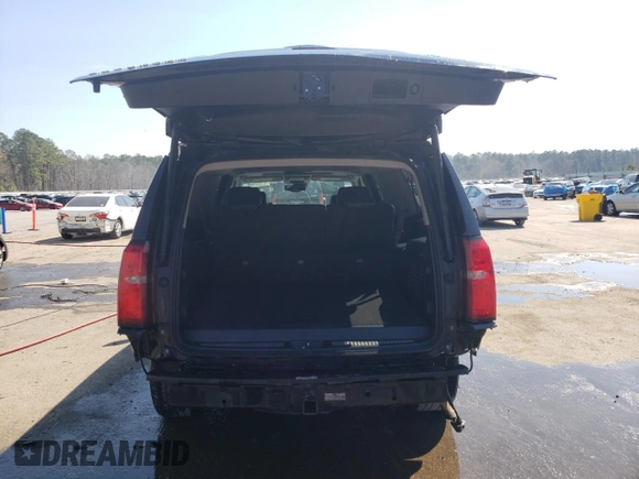 2015 Chevrolet Suburban LTZ with VIN 1GNSKKKC2FR210780, listed as a Copart auction lot 47207445 with 163,448 mi miles and Salvage Title. Bid and sale history available at carsss.com. Image 6.