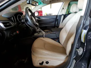 2015 Maserati Ghibli z VIN ZAM57XSA2F1146396, wystawiony jako Copart lot #56568585 z przebiegiem 85 556 mil mil oraz Szkoda całkowita • Salvage title. Historia ofert i sprzedaży dostępna na DreamBid. Obrazek 7.