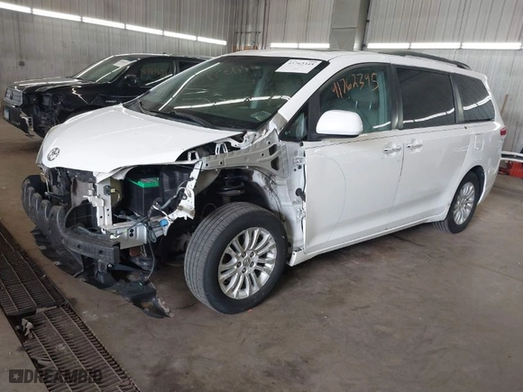 2012 Toyota Sienna XLE AAS with VIN 5TDYK3DC2CS196897, listed as a IAAI auction lot 41762345 with 183,188 mi miles. Bid and sale history available at carsss.com. Image 2.
