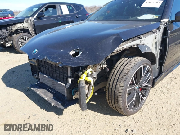2021 BMW 5 Series 540i xDrive with VIN WBA73BJ0XMWX01449, listed as a IAAI auction lot 41630703 with 65,212 mi miles and . Bid and sale history available at DreamBid. Image 6.