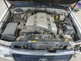 1999 Toyota Land Cruiser z VIN JT3HT05J5X0050404, wystawiony jako Copart lot #56066125 z przebiegiem 385 659 mil mil oraz Tytuł czysty. Historia ofert i sprzedaży dostępna na DreamBid. Obrazek 12.