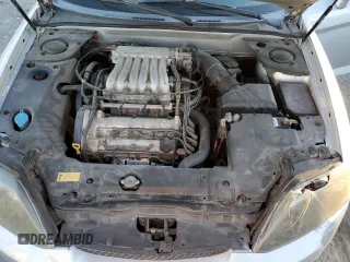2005 Hyundai Tiburon GT z VIN KMHHN65F05U171038, wystawiony jako Copart lot #87765735 z przebiegiem 113 129 mil mil oraz Szkody całkowita. Historia ofert i sprzedaży dostępna na DreamBid. Obrazek 12.