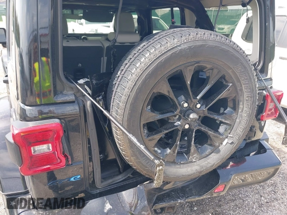 2021 Jeep Wrangler Unlimited Sahara with VIN 1C4JJXP63MW767719, listed as a IAAI auction lot 41906155 with 44,689 mi miles and . Bid and sale history available at DreamBid. Image 17.
