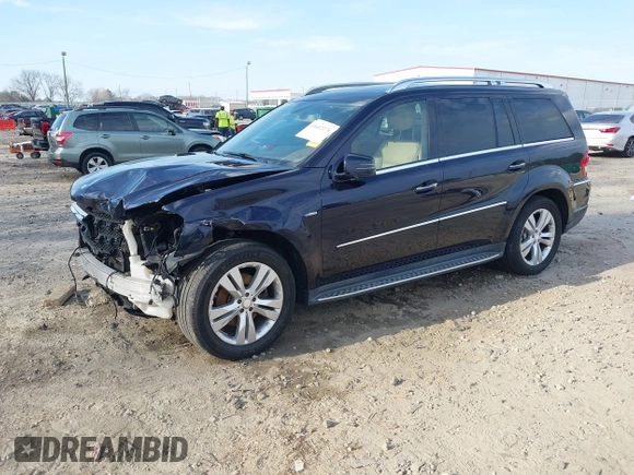 2012 Mercedes-Benz GL 350 with VIN 4JGBF2FE1CA768876, listed as a IAAI auction lot 41612274 with 104,718 mi miles and . Bid and sale history available at DreamBid. Image 2.