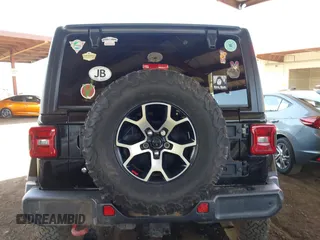 2019 Jeep Wrangler Unlimited Rubicon with VIN 1C4HJXFN5KW522991, listed as a IAAI auction lot 42609616 with 111,844 mi miles and . Bid and sale history available at DreamBid. Image 17.
