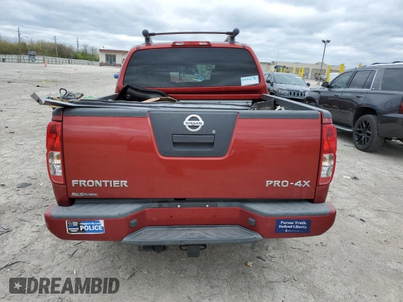 2012 Nissan Frontier Pro-4X z VIN 1N6AD0EV8CC454476, wystawiony jako Copart lot #53110155 z przebiegiem Nie podano mil oraz Szkoda całkowita • Salvage title. Historia ofert i sprzedaży dostępna na DreamBid. Obrazek 6.