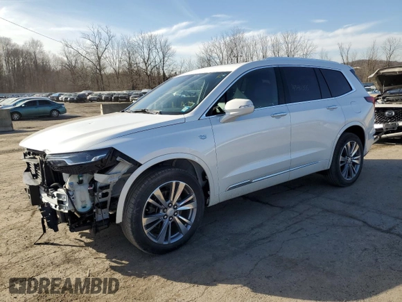 2022 Cadillac XT6 Premium Luxury z VIN 1GYKPDRS9NZ113152, wystawiony jako Copart lot #49411355 z przebiegiem 32 948 mil mil oraz Szkoda całkowita • Salvage title. Historia ofert i sprzedaży dostępna na DreamBid. Obrazek 1.