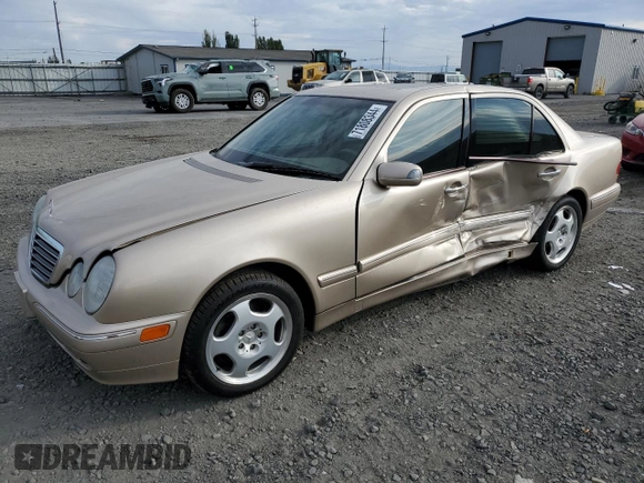 2001 Mercedes-Benz E-Class with VIN WDBJF70JX1B220786, listed as a Copart auction lot 71808344 with 94,476 mi miles and Salvage Title. Bid and sale history available at carsss.com. Image 1.