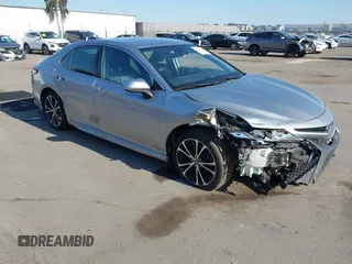 2019 Toyota Camry LE z VIN 4T1B11HK2KU789440, wystawiony jako IAAI lot #42229179 z przebiegiem 166 207 mil mil oraz . Historia ofert i sprzedaży dostępna na DreamBid. Obrazek 1.