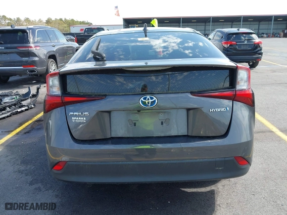 2021 Toyota Prius L Eco with VIN JTDKAMFU4M3134778, listed as a IAAI auction lot 41843429 with 145,757 mi miles. Bid and sale history available at carsss.com. Image 16.