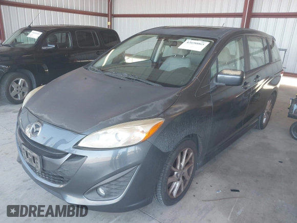 2012 Mazda 5 Touring with VIN JM1CW2CLXC0111947, listed as a IAAI auction lot 42690065 with 116,308 mi miles and . Bid and sale history available at DreamBid. Image 2.