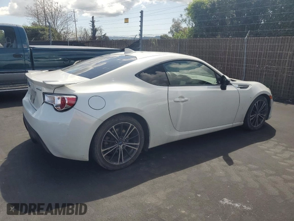 2015 Subaru BRZ Series.Blue with VIN JF1ZCAC17F9606883, listed as a Copart auction lot 51868565 with 69,373 mi miles and Salvage title. Bid and sale history available at DreamBid. Image 3.