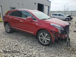 2023 Cadillac XT5 AWD Premium Luxury z VIN 1GYKNDR43PZ205643, wystawiony jako Copart lot #64576605 z przebiegiem 12 184 mil mil oraz Szkoda całkowita • Salvage title. Historia ofert i sprzedaży dostępna na DreamBid. Obrazek 4.