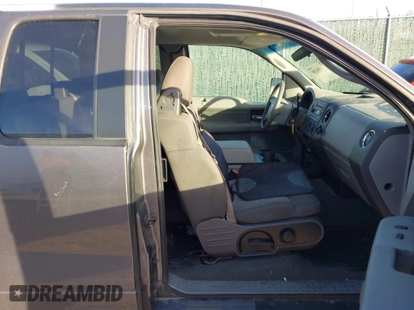 2005 Ford F-150 STX with VIN 1FTRX12W15KD34012, listed as a IAAI auction lot 41095300 with 178,984 mi miles. Bid and sale history available at carsss.com. Image 5.